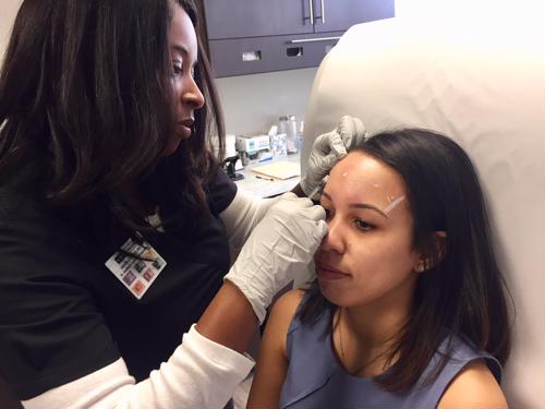 woman receiving Botox treatment