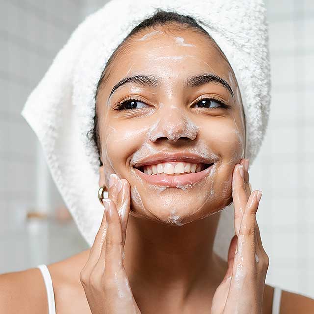 Young woman caring for skin